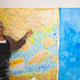 Nell Painter shows off her work